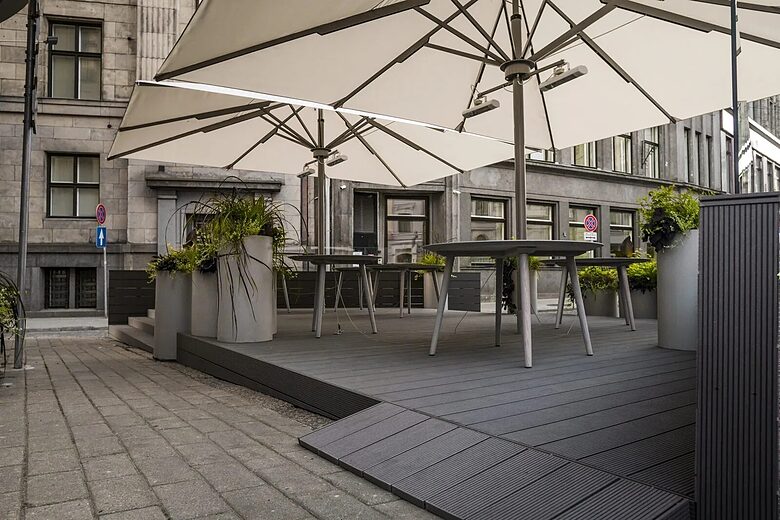 Composite decking boards on a cafe terrace in Riga